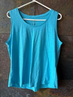 NWOT Chico’s turquoise tank top. Sz 2/ 12. 
60% cotton, 40% modal.